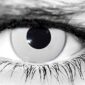 Person wearing white-out Prescription Zombie Contacts with special FX makeup